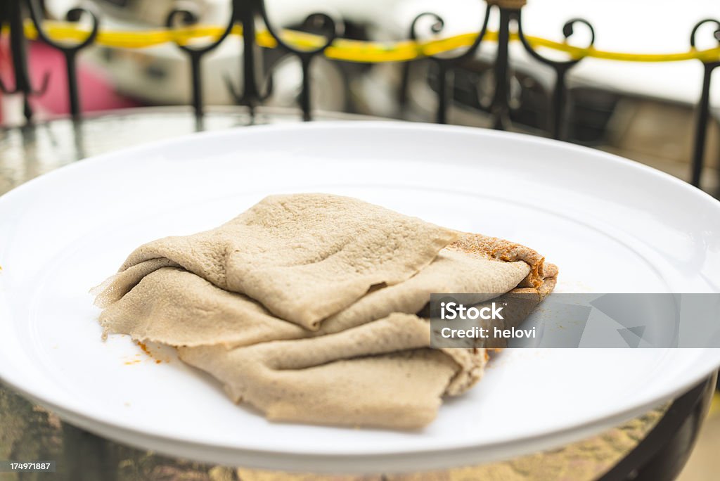 Injera "Injera is like a pancake made  of type of wheat with all kind of vegetables and meat. It is traditionall food in Ethiopia, Eritrea, Somalia, Yemen, and Sudan." Somalia Stock Photo