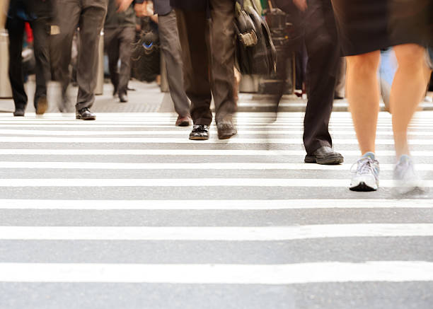 istock People crossing street on zebra x-ing, NYC 174972295