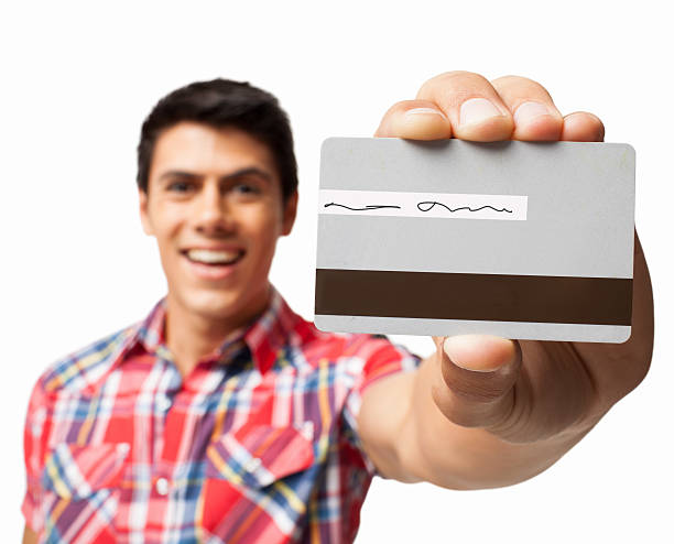 istock Man Showing Credit Card - Isolated 174972831