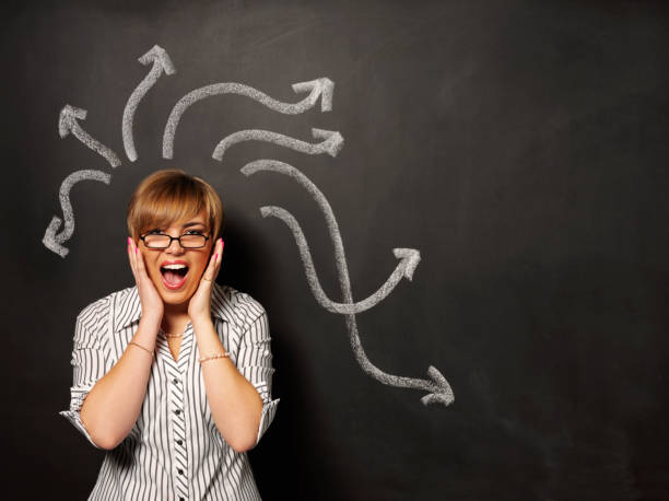istock Stressed Businesswomen with Arrows 174973070