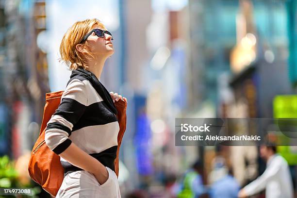 New York City Girl With Dark Specs Looking Up Stock Photo - Download Image Now - New York City, One Woman Only, City