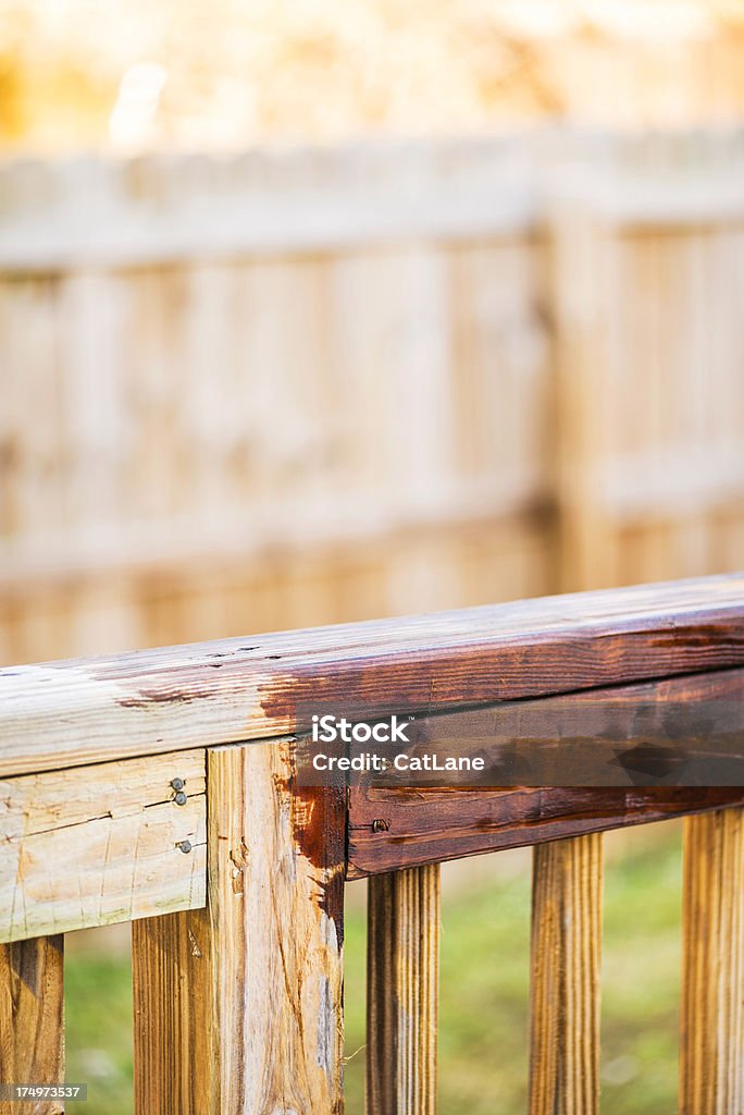 Half Stained Deck Deck halfway through being stained Deck Stock Photo