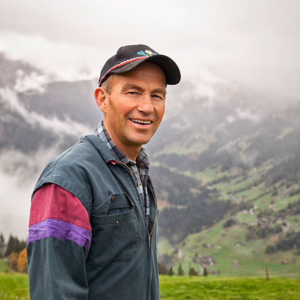 istock Smiling Swiss Farmer In Mountains. 174973858