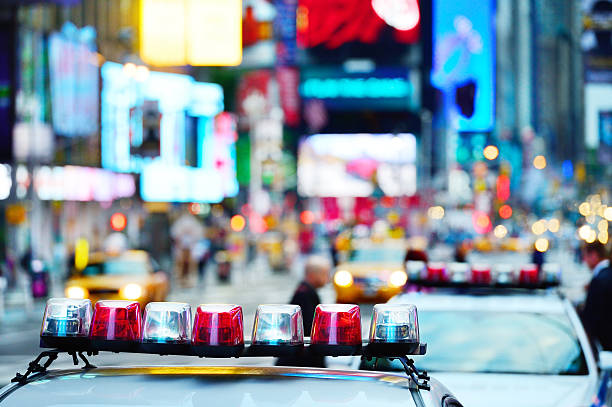 istock Police car i NYC, evening lights 174973906