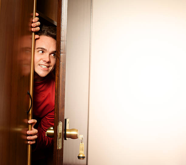 istock Porter hiding in a hotel room 174974028