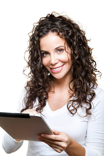 istock Young Woman Holding Tablet 174974234