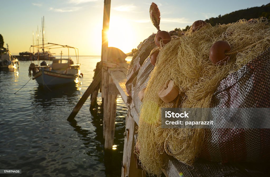 Reti da pesca in un piccolo molo romantica in Grecia - Foto stock royalty-free di Cibo