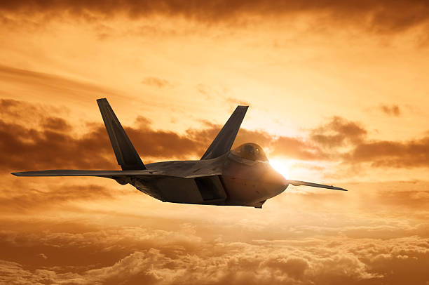 istock F22 Military Jet soars across a Dramatic Sunset 174974480