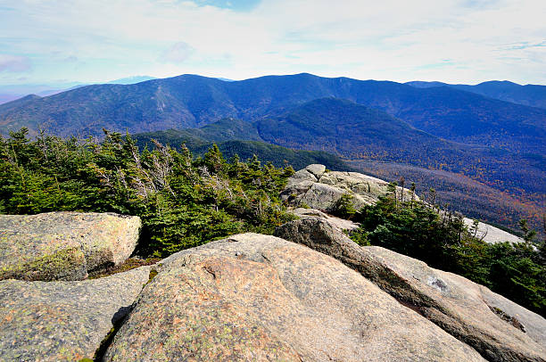 Galehead and the Twins from Mt. Garfield Summit View towards the east from the Mt. Garfield summit clearly showing North Twin Mountain, South Twin Mountain, and Galehead Mountain. Other mounatins in this scene include Guyot, West Bond, Mt. Bond, Mt. Washington, and the Northern Presidentials: Adams, Jefferson, and Clay (Madison not seen), Also showing are Hale and Willey (I think). Mt. Garfield is located on the northern rim of the White Mountains of New Hampshire. This was taken at the height of the foliage season for 2012. white mountains new hampshire stock pictures, royalty-free photos & images