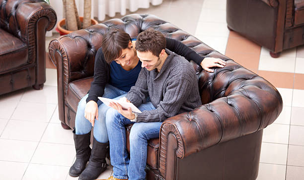 istock Young couple surfing the web on their tablet 174974977