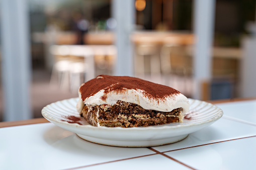 Tiramisu In Plate On Table