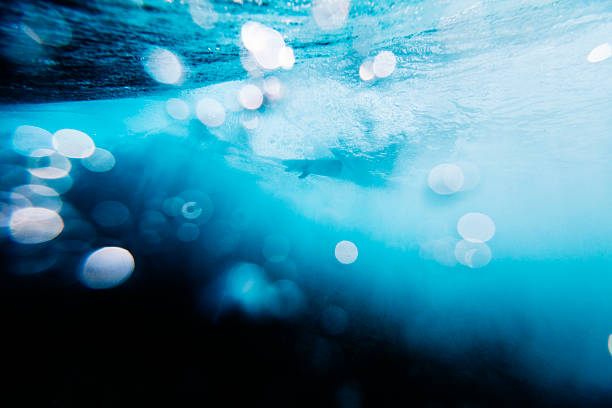 istock underwater view of wave with droplet specks 174975177