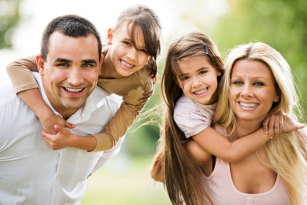 istock Embraced family enjoying in park. 174975311