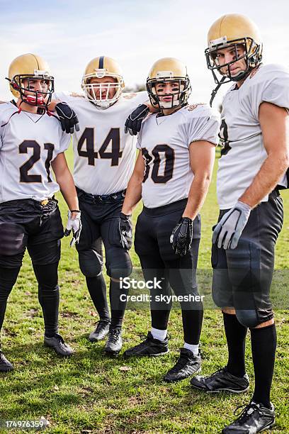 American Football Players On The Field Stock Photo - Download Image Now - Achievement, Activity, Adult