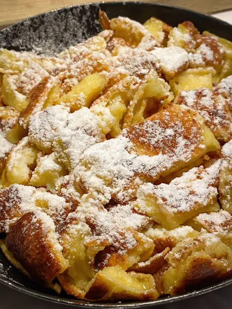 Famous Austrian sweet dish Kaiserschmarrn served in a pan