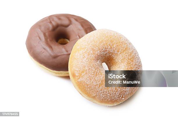 Donuts Sobre Blanco Foto de stock y más banco de imágenes de Alimento - Alimento, Azúcar, Buñuelo en forma de rosca