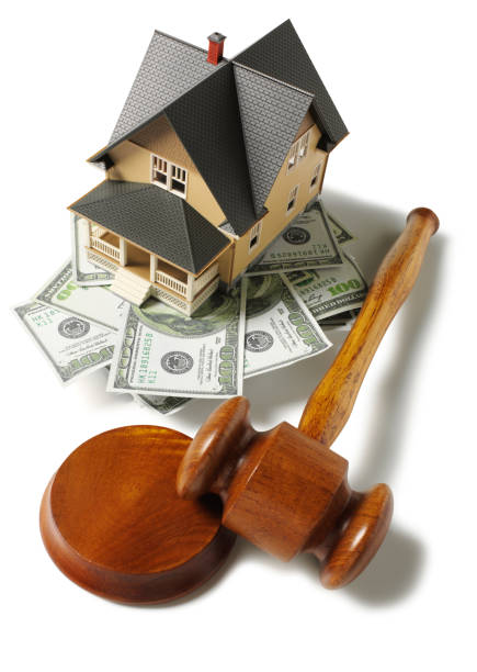 istock American Dollars Under a Toy Model House 174977494