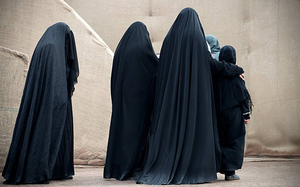 istock Unrecognized muslim women walking 174977537