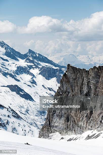 Powder Snow At Mountain Peaks Stock Photo - Download Image Now - Blue, Cloud - Sky, Color Image
