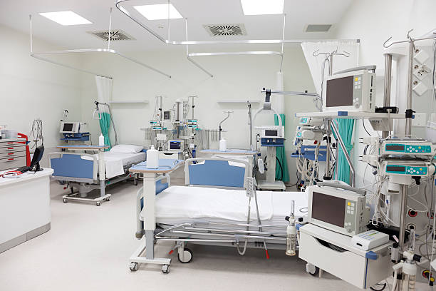 istock Empty beds in a hospital room with equipment 174978758