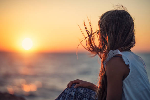 4,800+ Girl Looking Out To Sea Stock Photos, Pictures & Royalty-Free Images - iStock