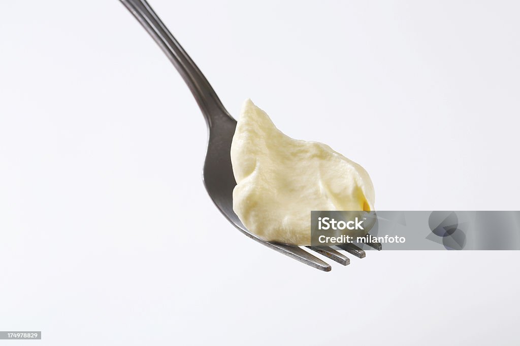 Panna distribuite su una forchetta - Foto stock royalty-free di Alimentazione sana