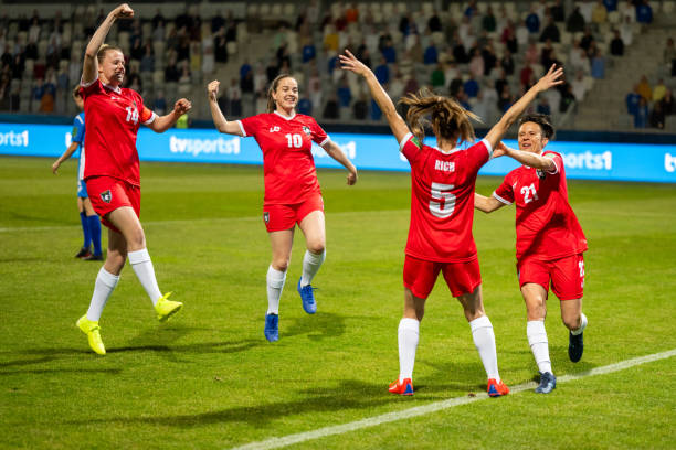 istock Soccer team celebrating after scoring a goal 1749790113