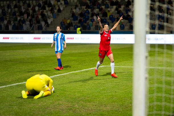 istock Soccer player running after scoring a goal 1749790127