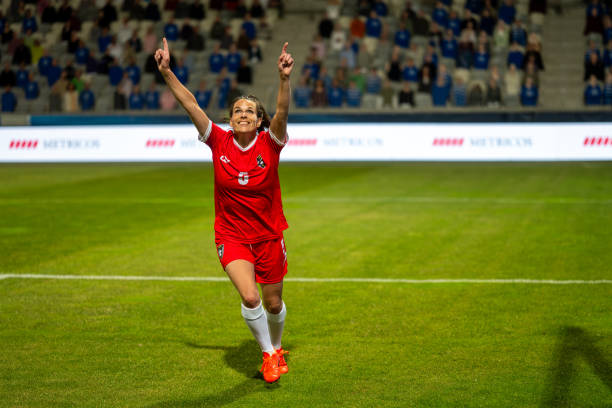istock Soccer player running after scoring a goal 1749790133