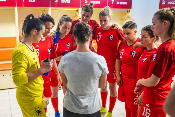 istock Soccer trainer explaining game strategy to players 1749790219