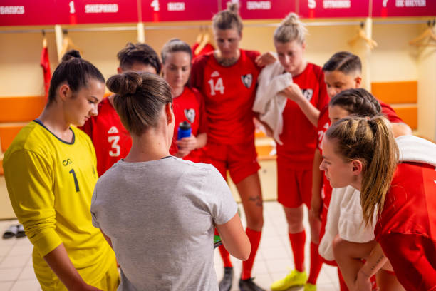 istock Soccer trainer explaining game strategy to players 1749790220