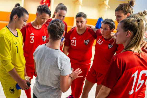 istock Soccer trainer explaining game strategy to players 1749790228