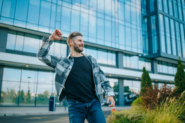 istock Authentic Triumph Smiling Caucasian Guy Achieving Success 1749790682