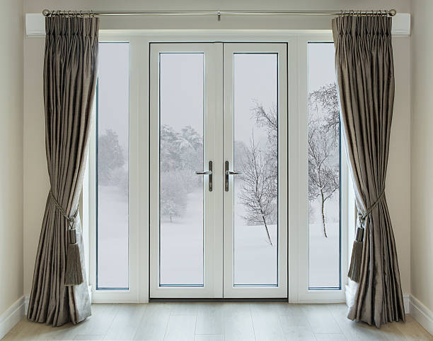 застекленные створчатые двери с зимними видом - curtain tie стоковые фото и изображения