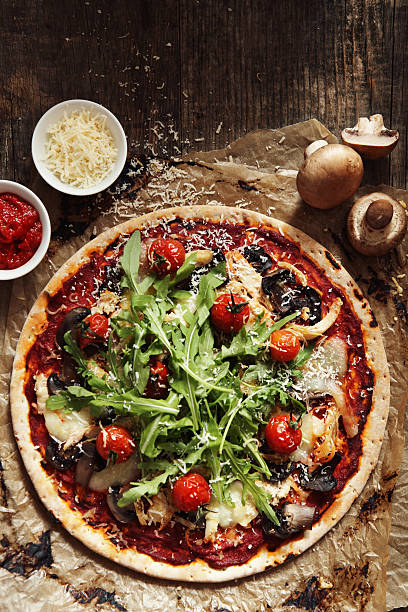 istock Tasty pizza with parmesan cheese 174979205