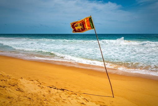 Red flag with the sea, Signal warning.