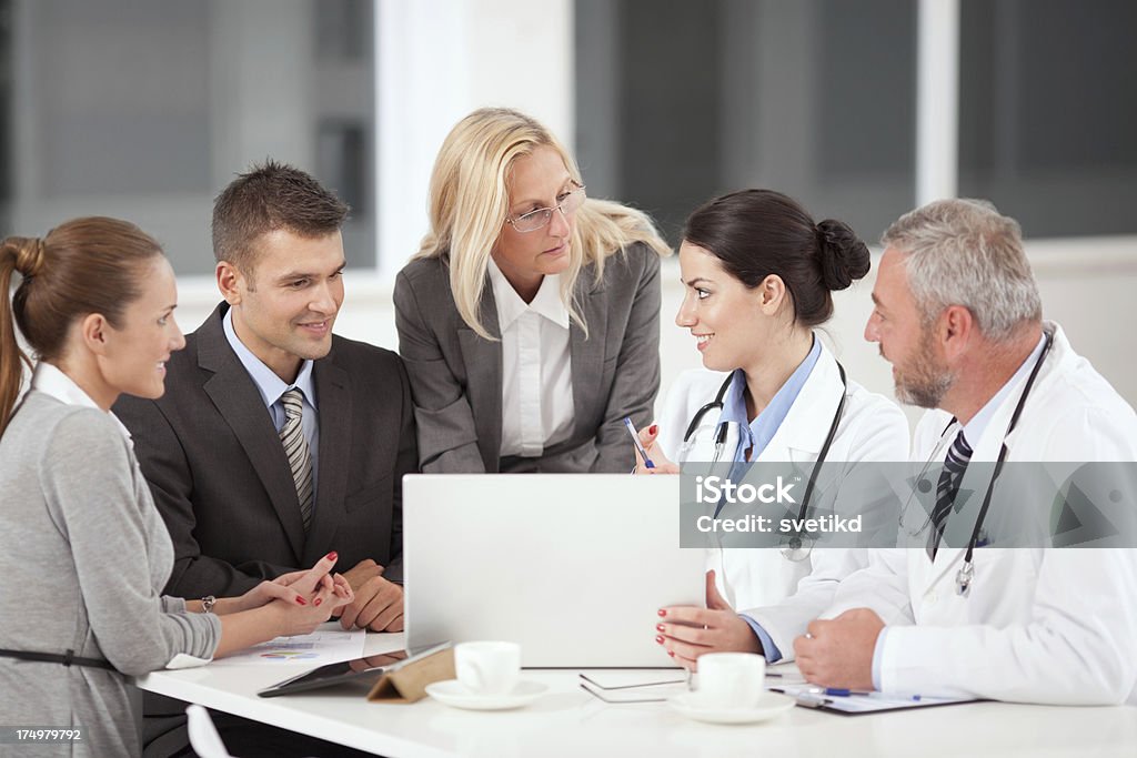 Médicos na reunião de negócios. - Royalty-free Diretor Executivo de Empresa Foto de stock