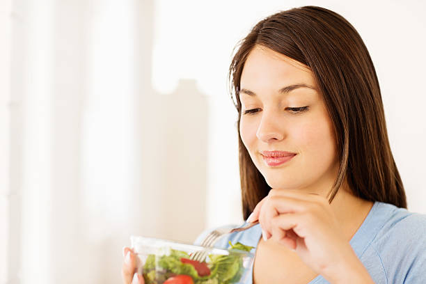 istock Female Having Vegetable Salad 174979887