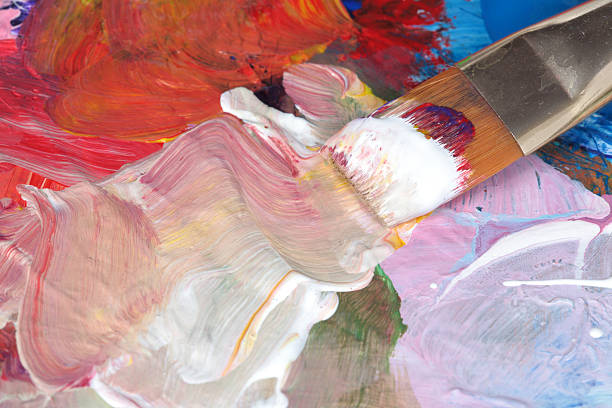 istock Artist's palette with wet paint and paintbrush 174979943