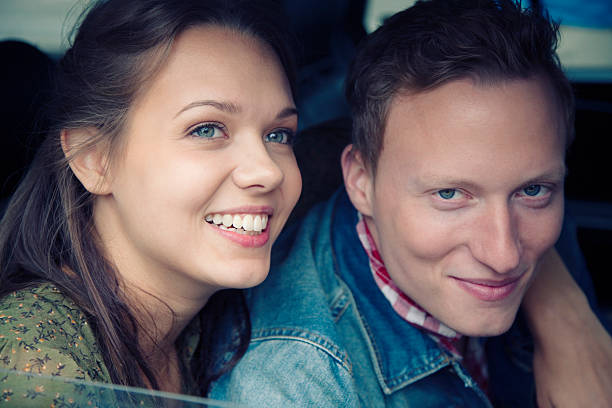 istock Young Smiling Couple in Taxi 174980210
