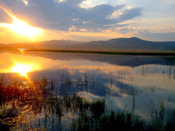 istock Sunset on the lake. Mountain steppe - protected area 1749805975