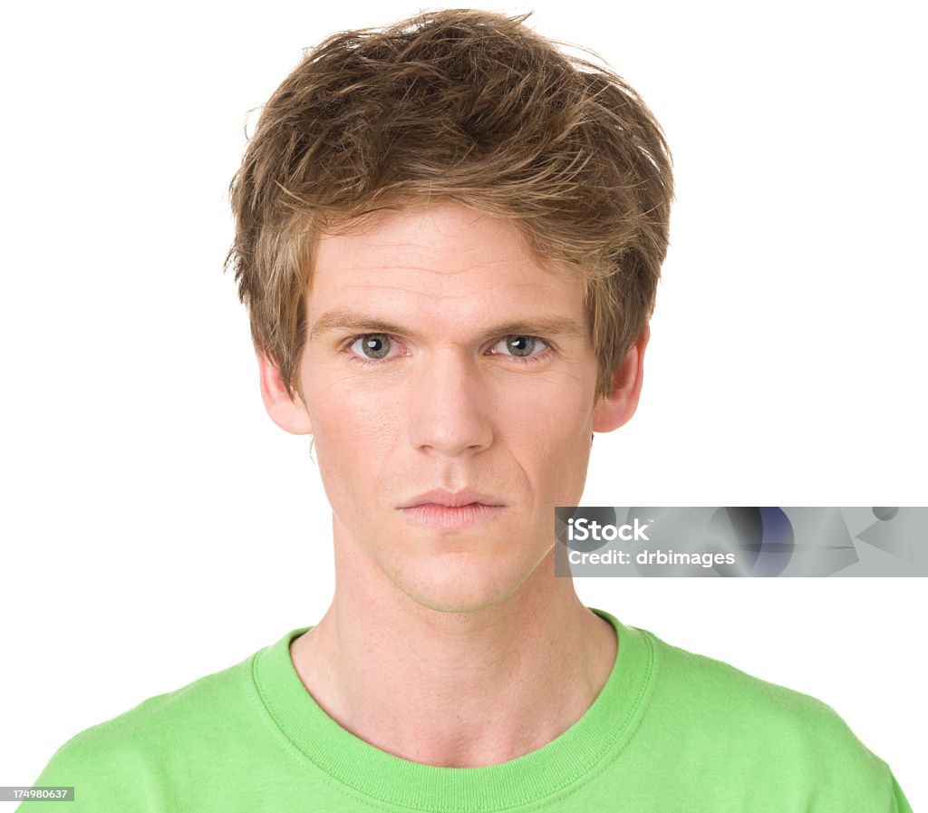 Serious Young Man Portrait Portrait of a young man on a white background. http://s3.amazonaws.com/drbimages/m/003bk.jpg 20-29 Years Stock Photo