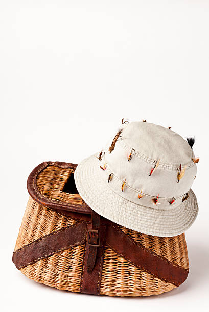 Fishermans Hat With Flyfishing Lures Whicker Creel White Bac Stock Photo -  Download Image Now - iStock