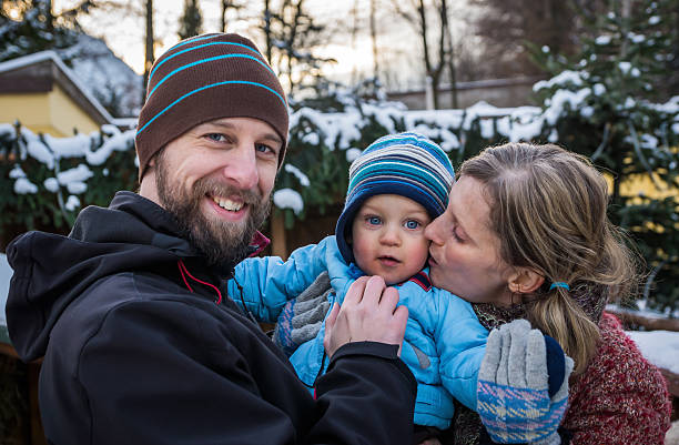 istock Young Family Outdoors in Winter 174981283