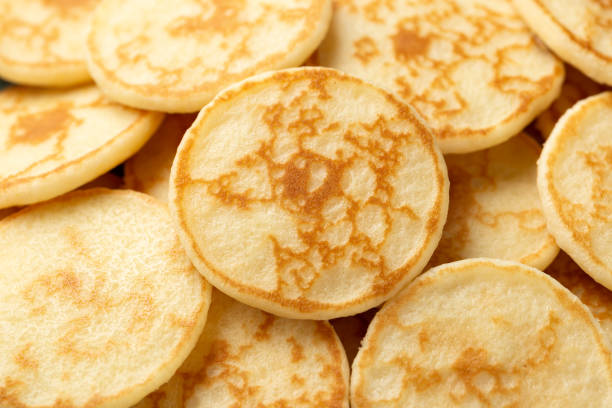 Close up Cocktail Blinis or mini blinis Close up Cocktail Blinis or mini blinis. mini pancakes stock pictures, royalty-free photos & images
