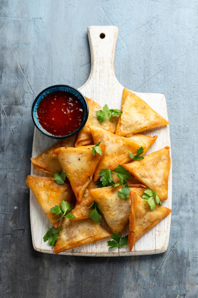 istock Poppy seeds Vegetable samosa served with sweet chilli sauce 1749820408