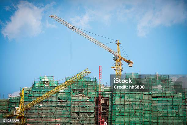 Concrete Highrise Construction Site Stock Photo - Download Image Now - Apartment, Architectural Column, Blue