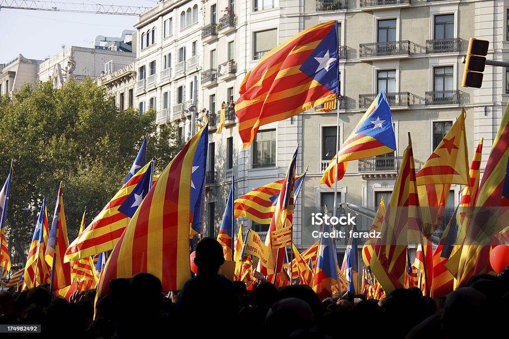 Celebrating National Day of Catalonia Many people which the official sources estimated at 1.5 million celebrate the national day of Catalonia (11th of September) with Catalan flags. Catalonia Stock Photo