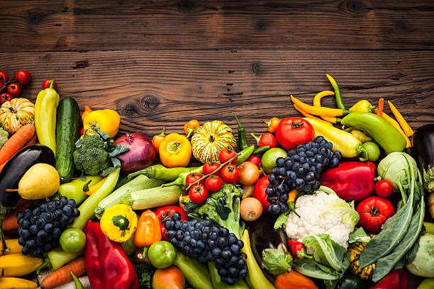 istock Fruits and vegetables on wood table 174982734