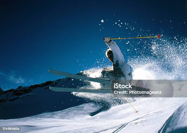 Woman Skier Backlit Otago New Zealand Stock Photo - Download Image Now - Adult, Adults Only, Blue